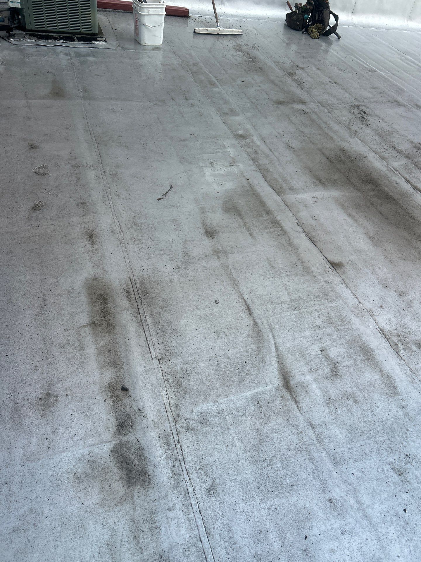 How do I know if a dent or worn spot in my roof membrane is serious?